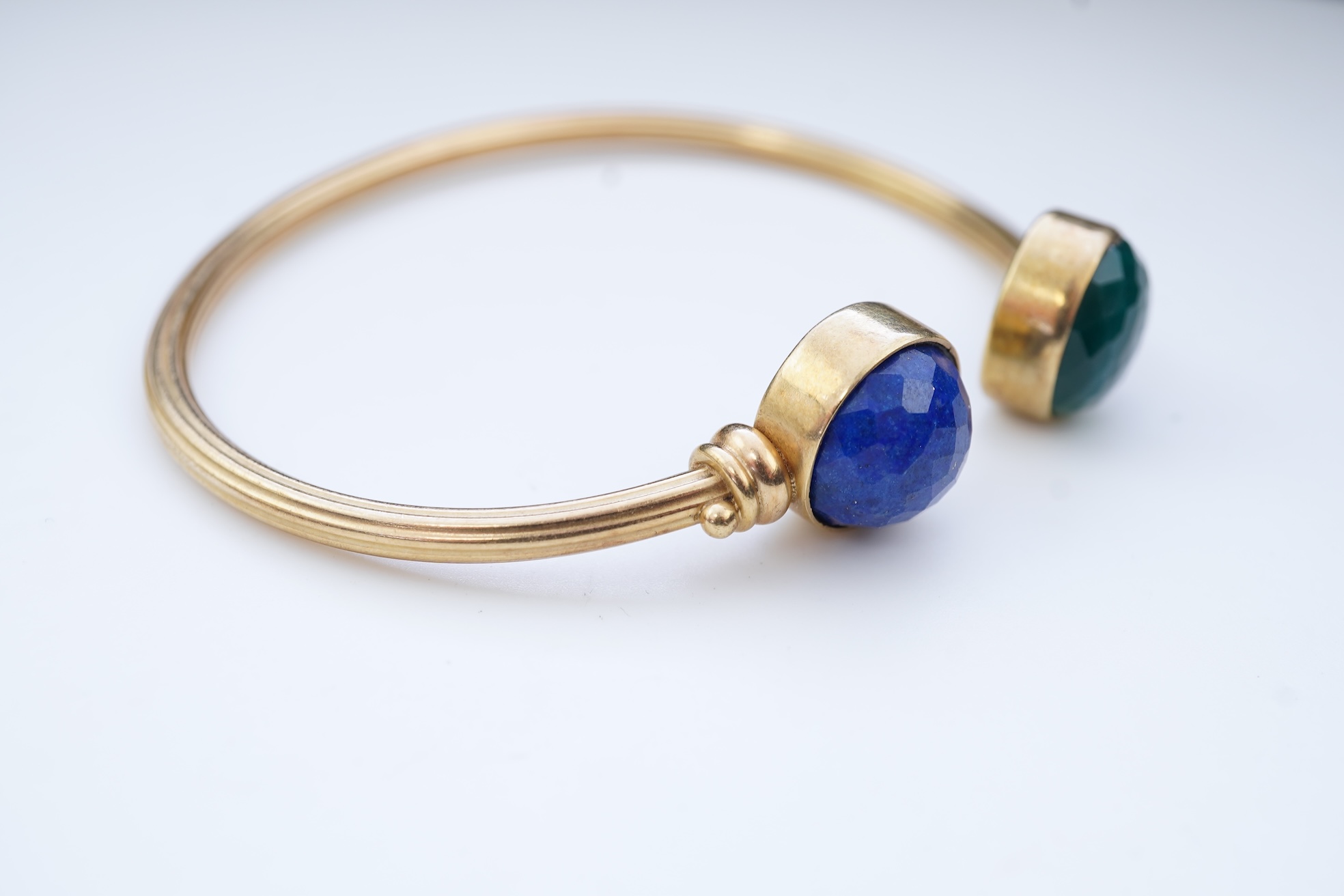 A gold, lapis lazuli and green chalcedony bangle